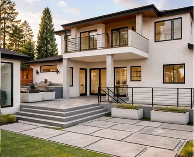a view of a house with couches and a patio
