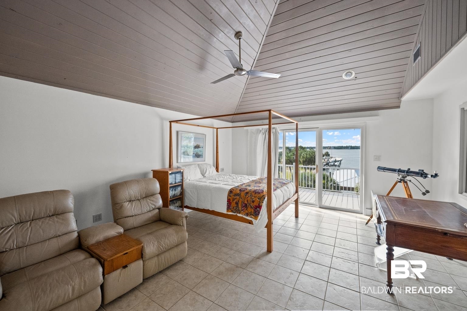 29255 Ono Boulevard Orange Beach, AL 36561 - Photo 32 of 43 Bedroom featuring access to exterior, wood ceiling, lofted ceiling, light tile patterned flooring, and ceiling fan