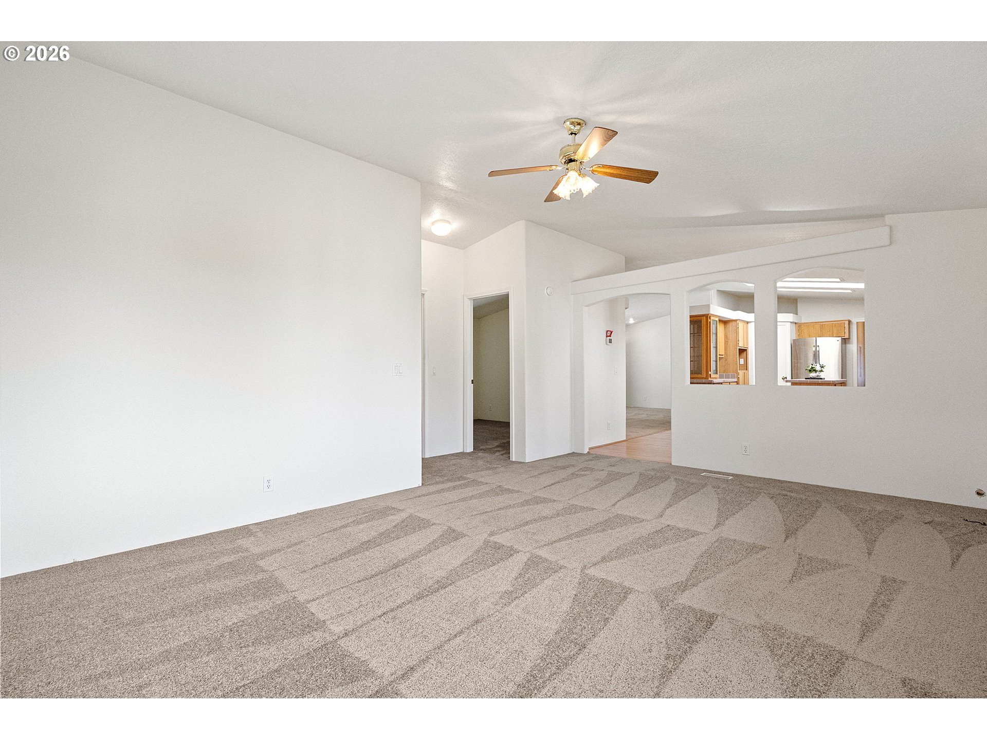 98041 Hallway Road, Unit 41 Brookings, OR 97415 - Photo 27 of 48 a view of an empty room with a window