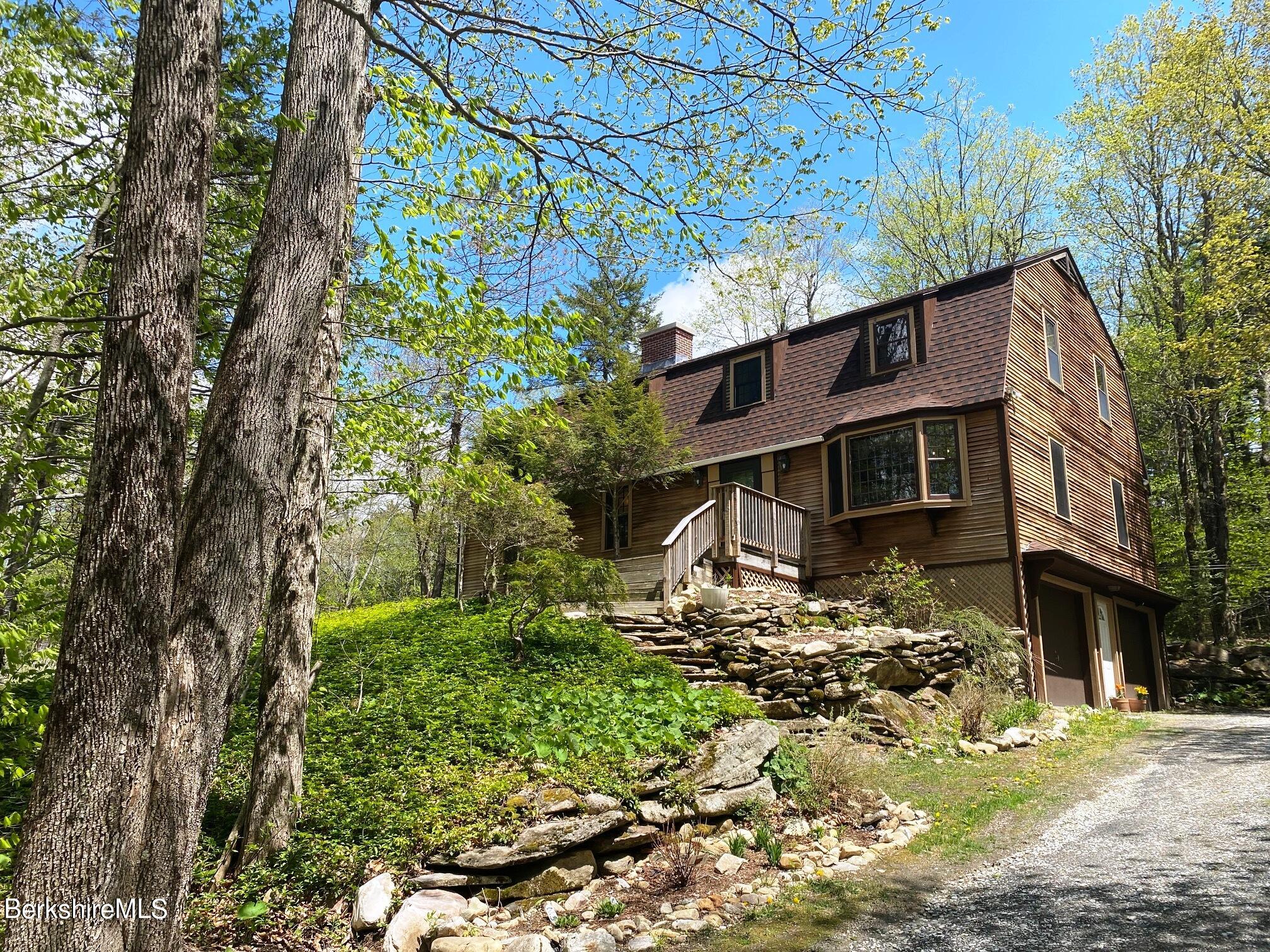 24 Andes Road Peru, MA 01235 - Photo 1 of 56 a front view of a house with a yard