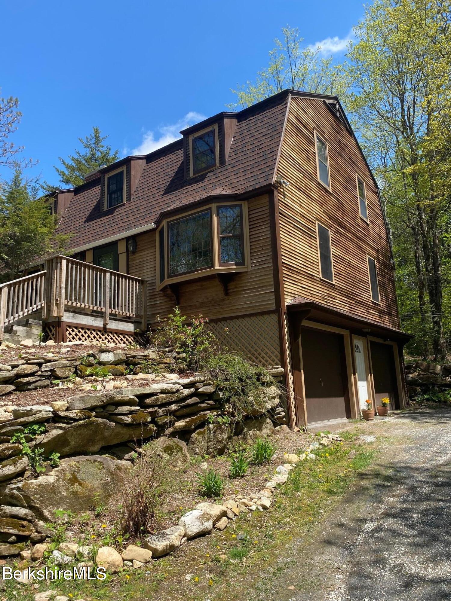 24 Andes Road Peru, MA 01235 - Photo 19 of 56 a front view of a house with a yard