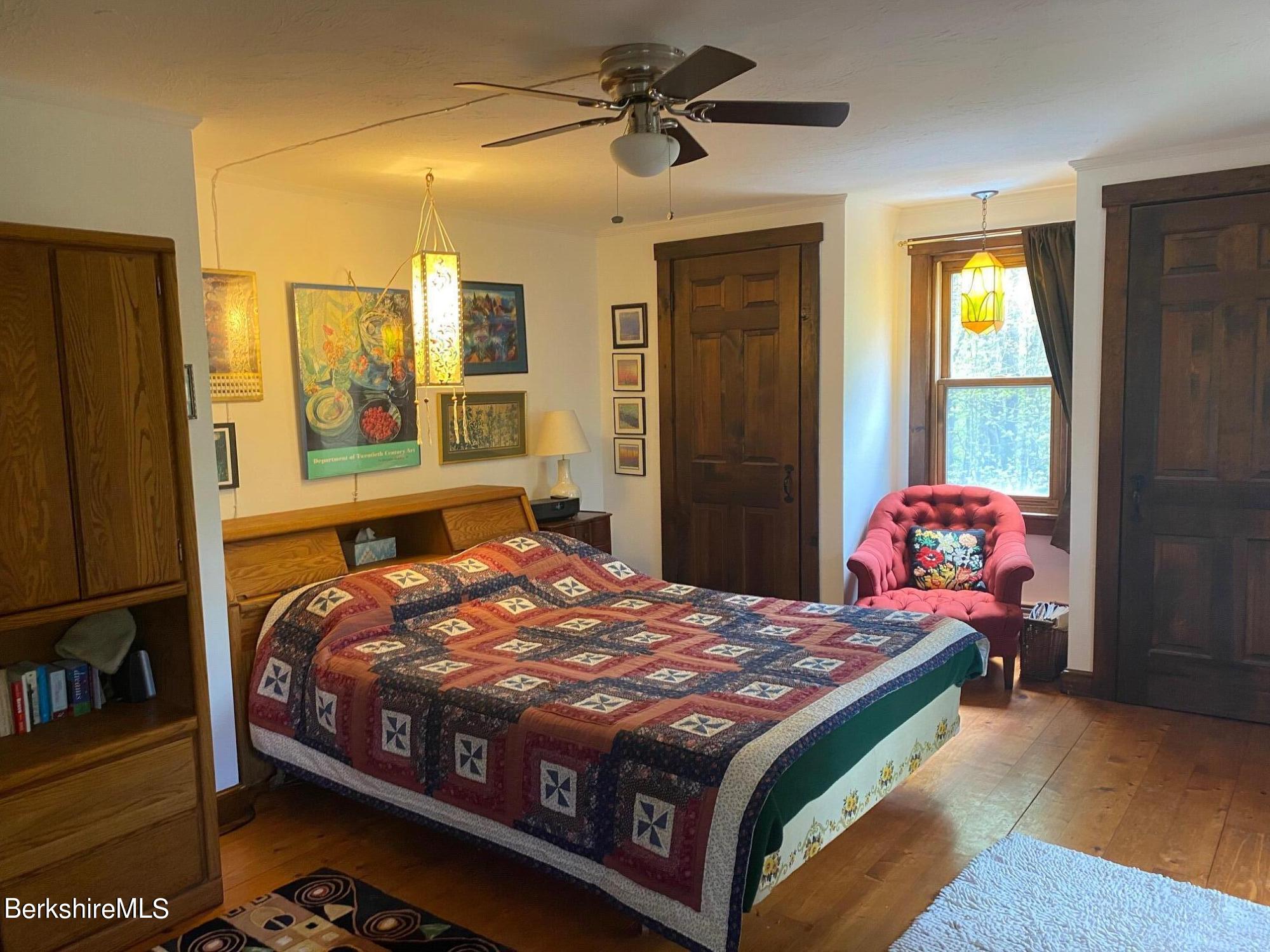 24 Andes Road Peru, MA 01235 - Photo 23 of 56 a bedroom with a bed dresser and a window