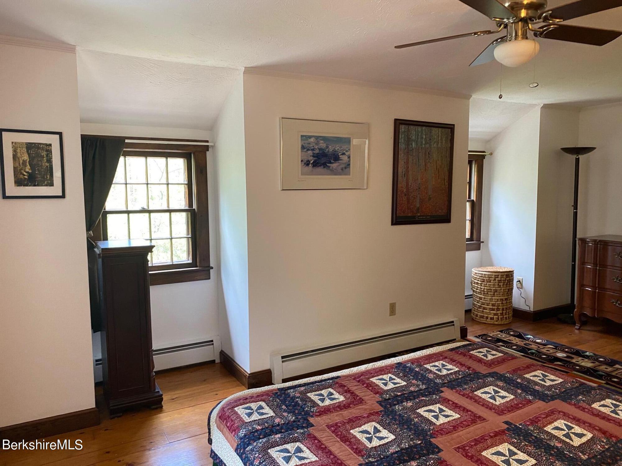 24 Andes Road Peru, MA 01235 - Photo 24 of 56 a bedroom with a bed and a window