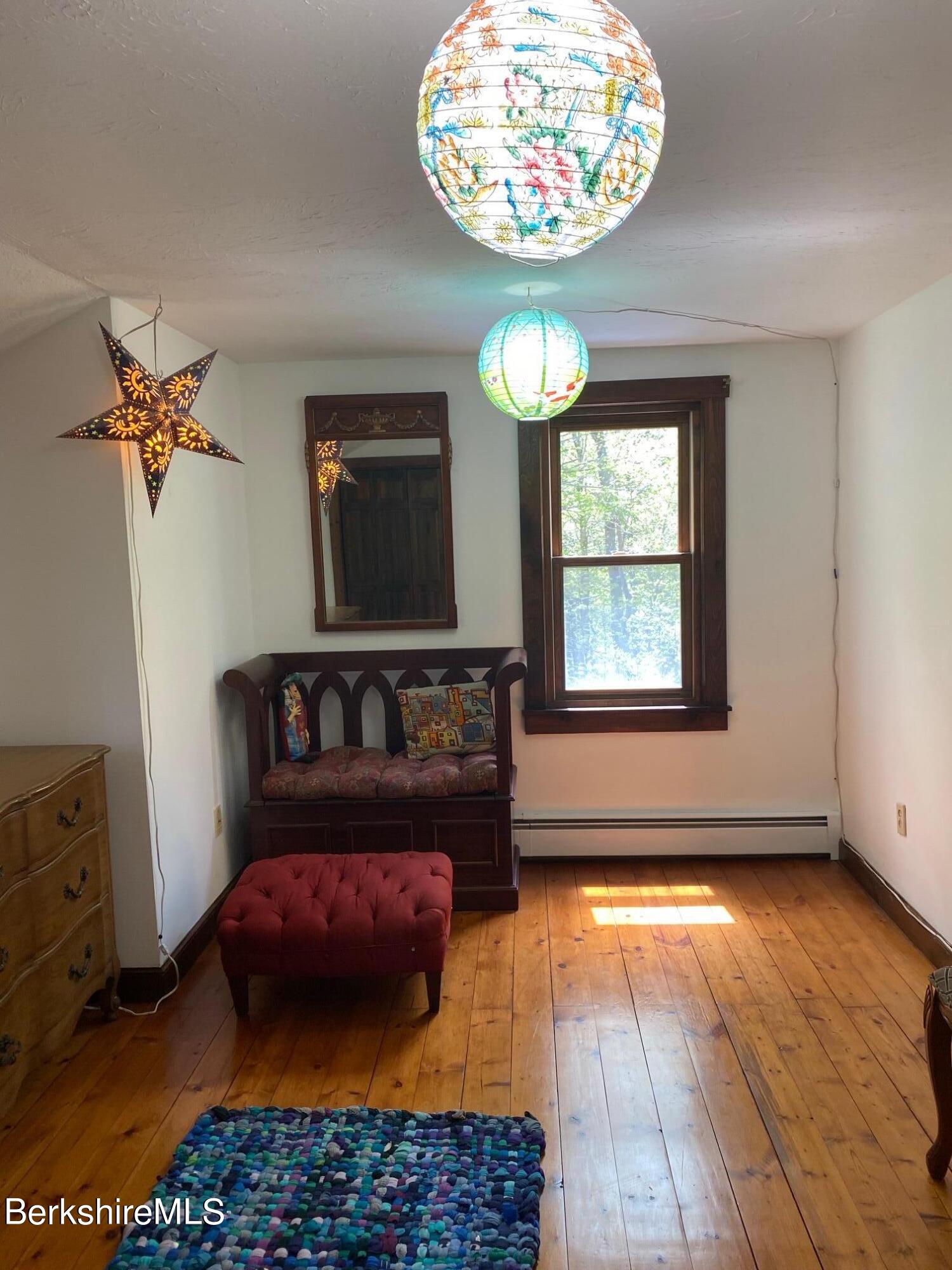 24 Andes Road Peru, MA 01235 - Photo 27 of 56 a bedroom with furniture and a window