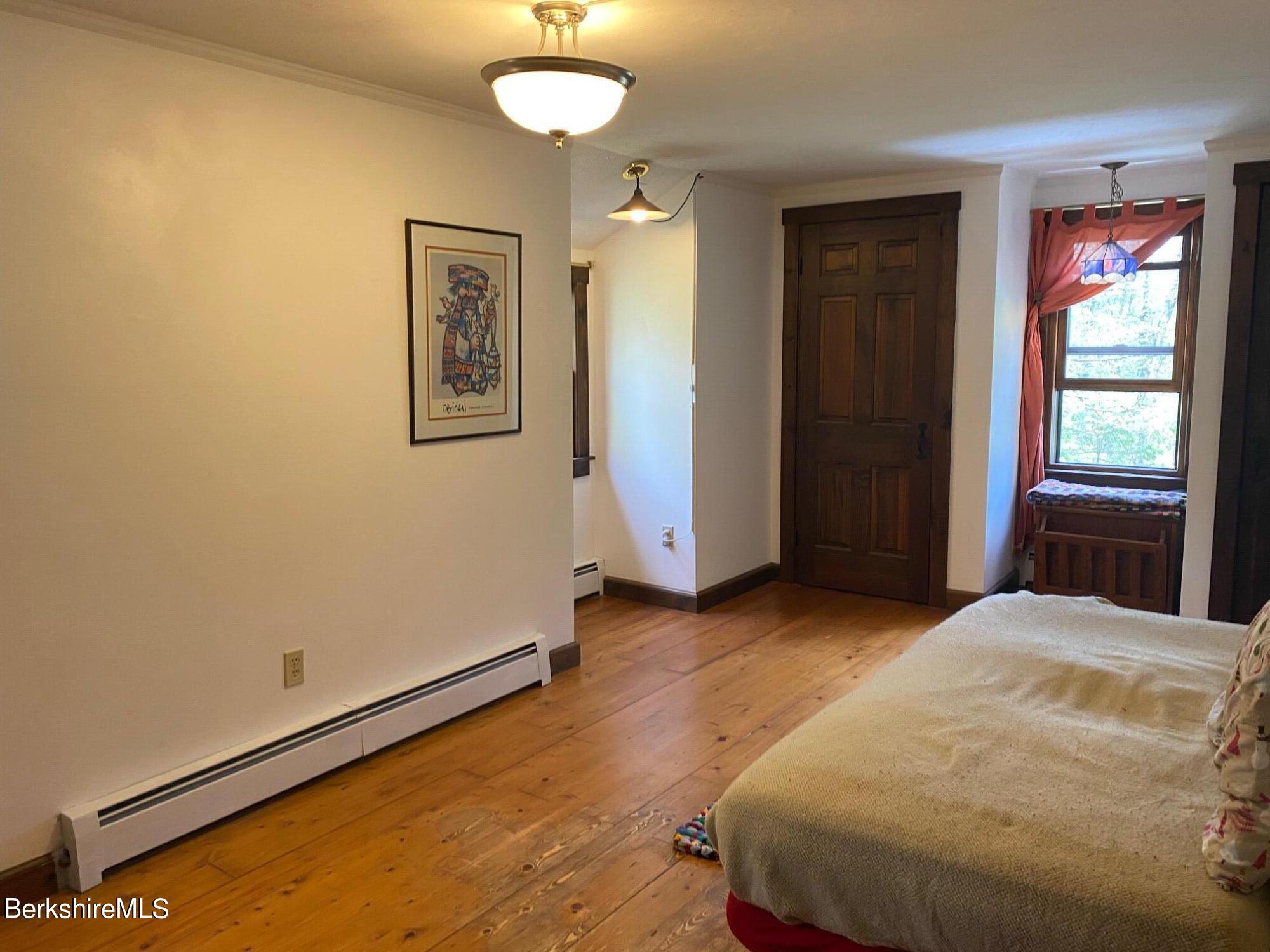 24 Andes Road Peru, MA 01235 - Photo 30 of 56 a bedroom with a bed and a window