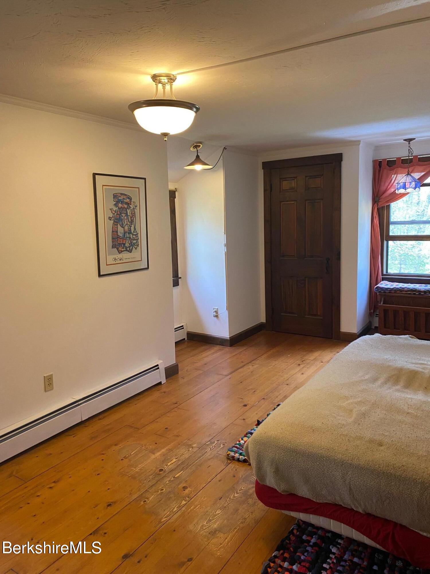 24 Andes Road Peru, MA 01235 - Photo 31 of 56 a bedroom with a bed and a window
