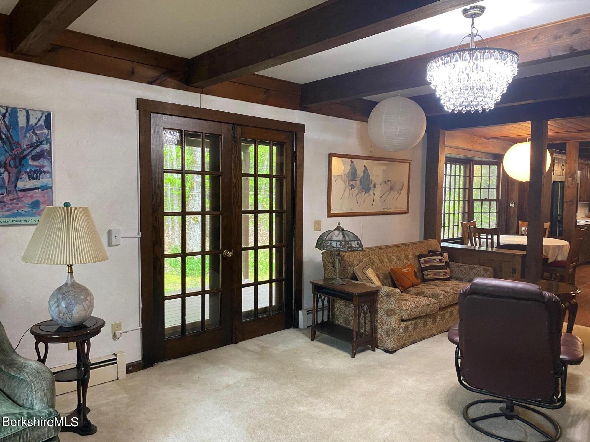 24 Andes Road Peru, MA 01235 - Photo 34 of 56 a living room with furniture and a large window