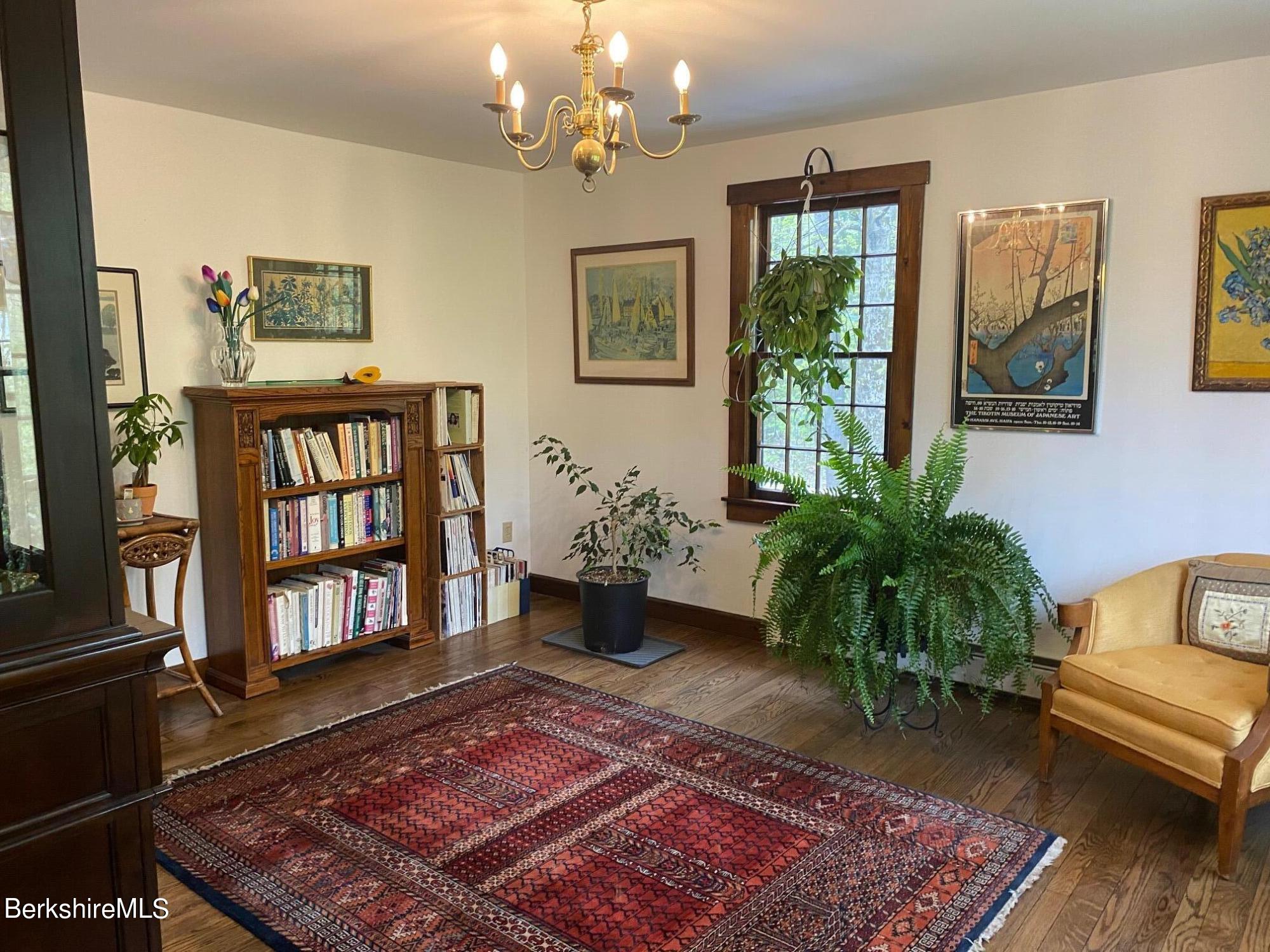 24 Andes Road Peru, MA 01235 - Photo 36 of 56 a living room with furniture and a rug