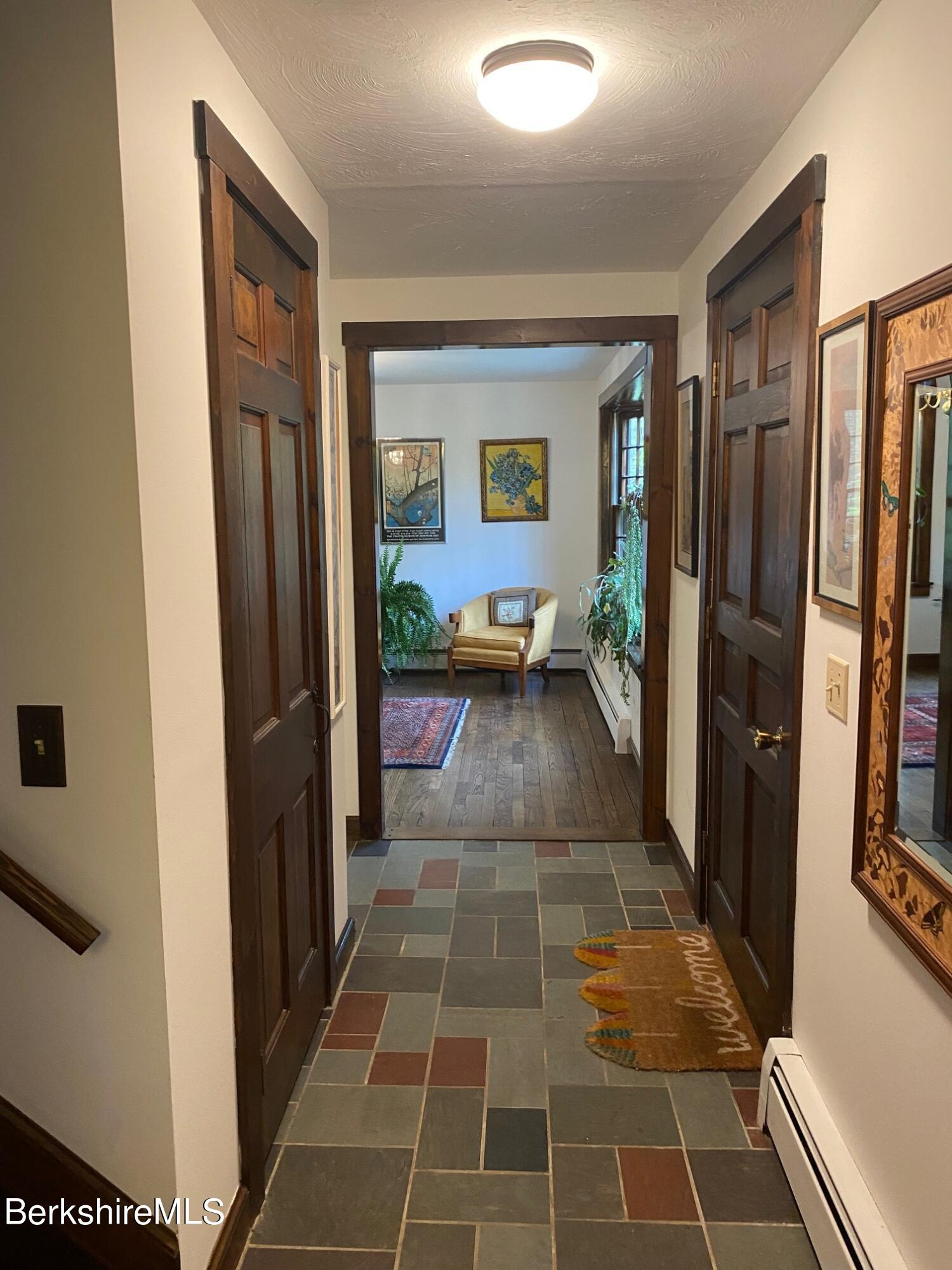 24 Andes Road Peru, MA 01235 - Photo 46 of 56 a hallway with a black and white checkered floor