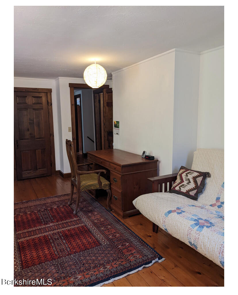 24 Andes Road Peru, MA 01235 - Photo 54 of 56 a living room with furniture and a rug