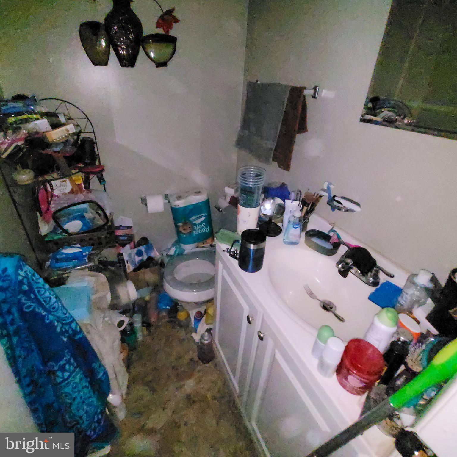 672 Yorkshire Drive Edgewood, MD 21040 - Photo 17 of 35 a bathroom with a sink mirror and toilet