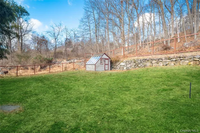 a view of a park with large trees