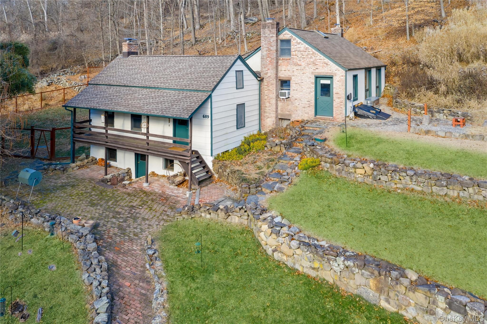 689 South Mountain Road New City, NY 10956 - Photo 26 of 28 a aerial view of a house with a yard