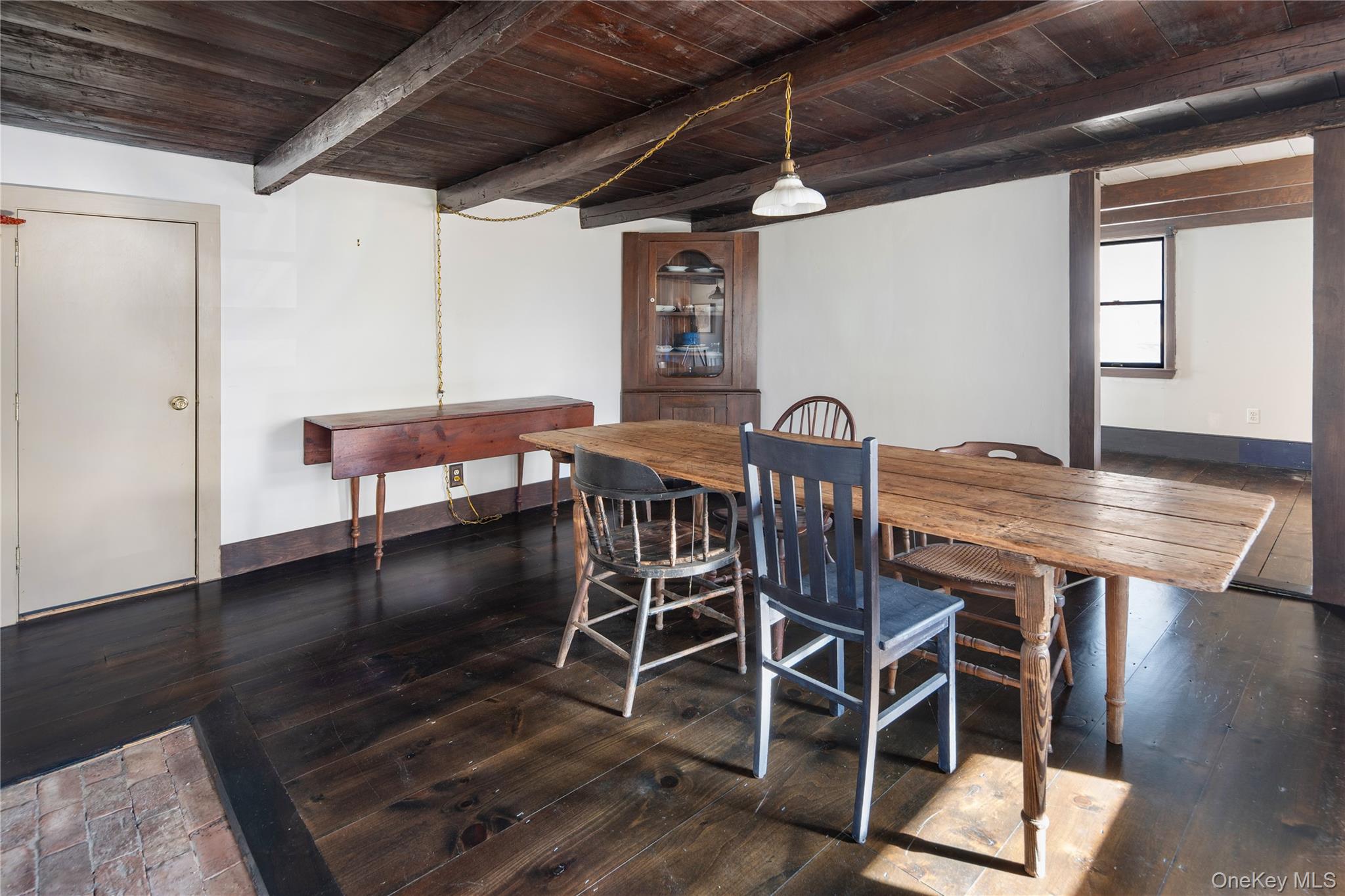 689 South Mountain Road New City, NY 10956 - Photo 5 of 28 a dining room with furniture and wooden floor