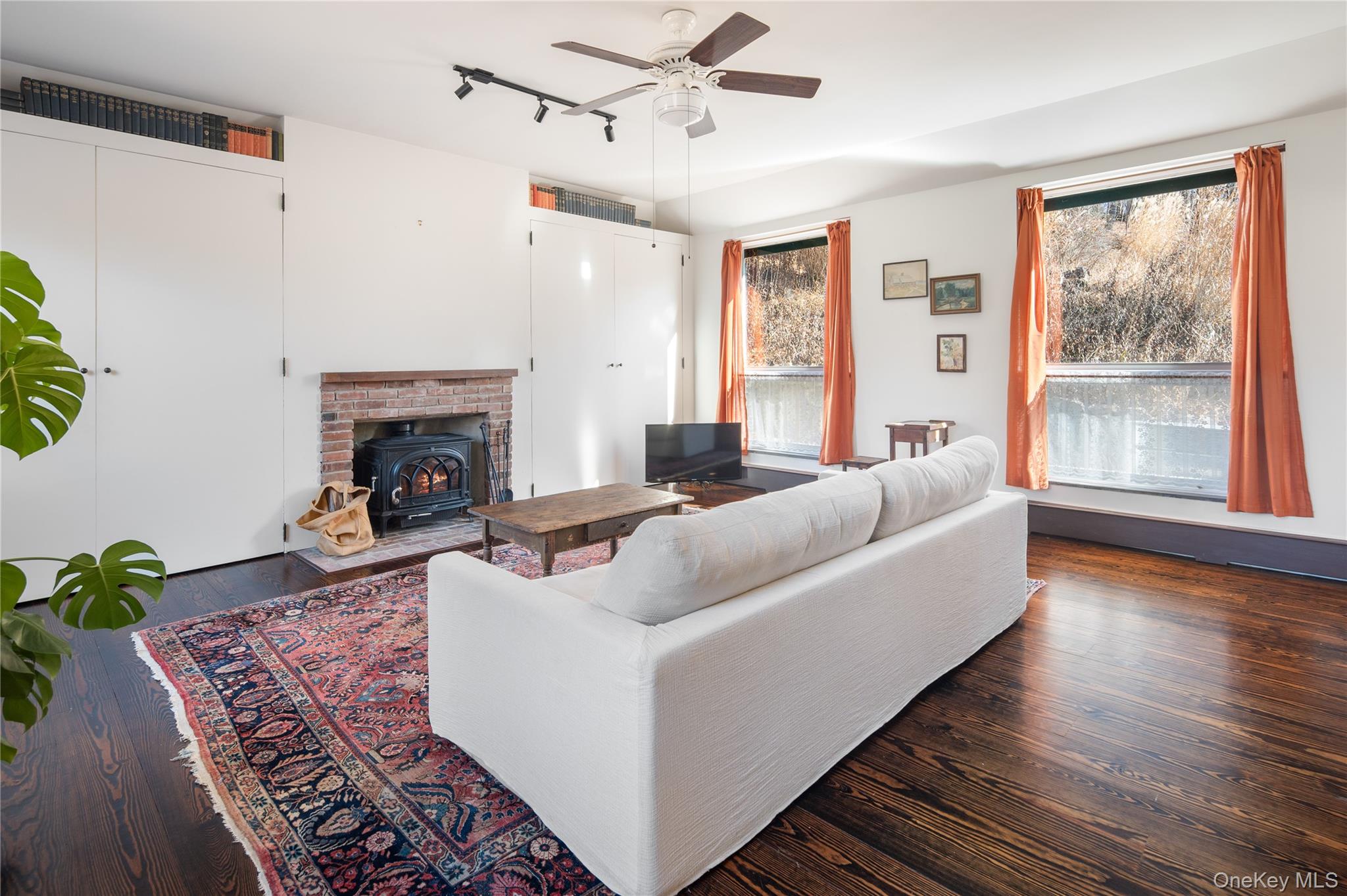 689 South Mountain Road New City, NY 10956 - Photo 7 of 28 a living room with furniture and a fireplace