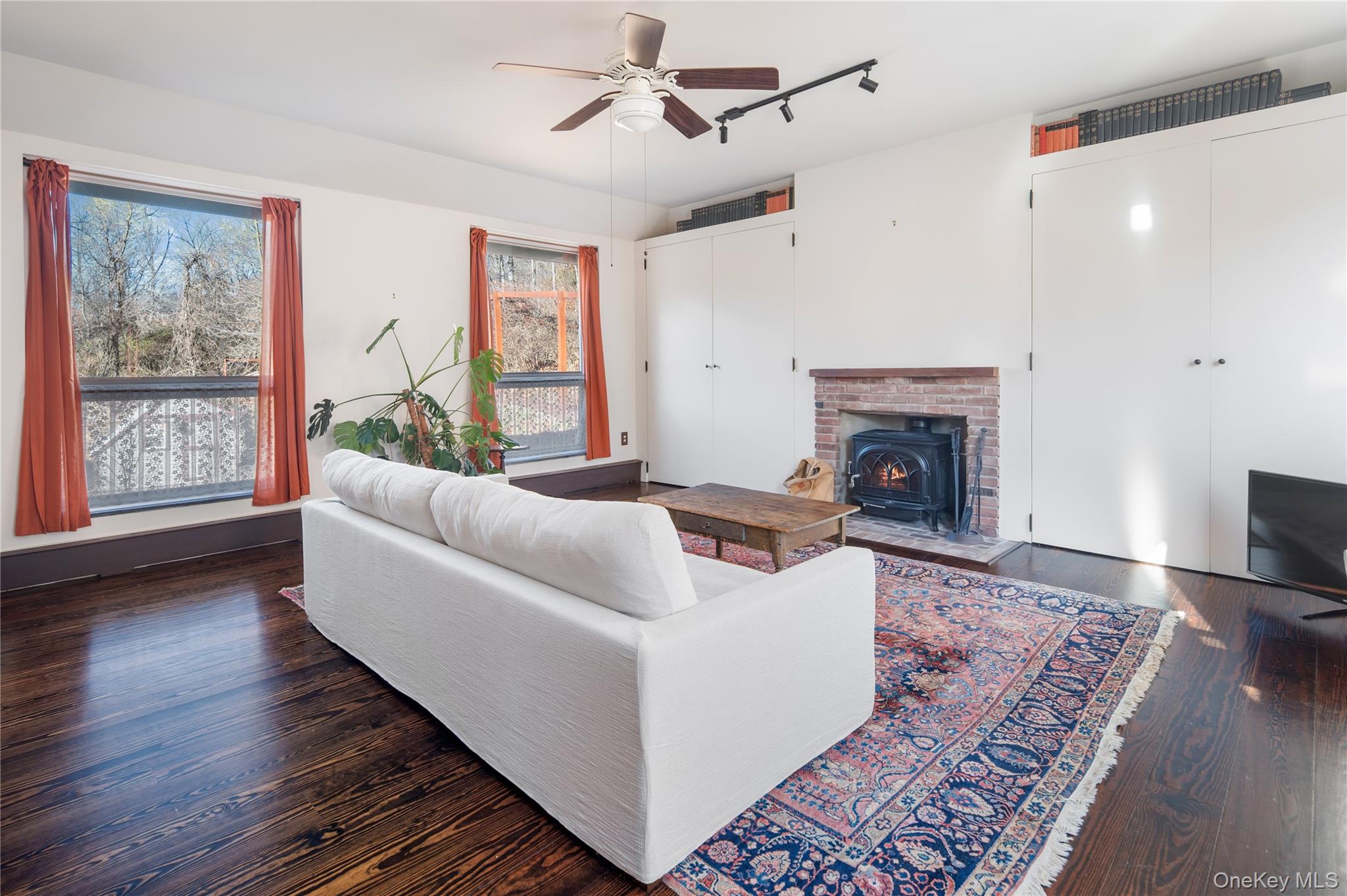 689 South Mountain Road New City, NY 10956 - Photo 8 of 28 a living room with furniture and a fireplace