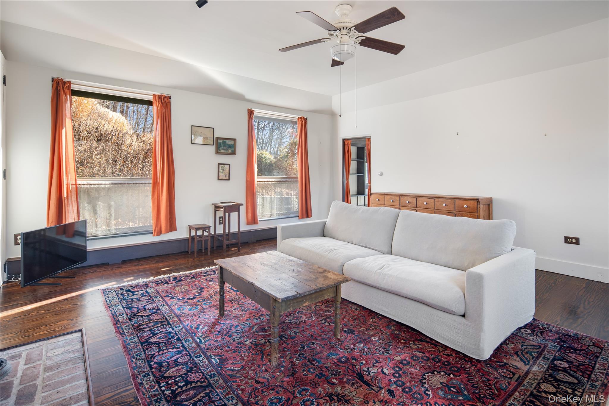 689 South Mountain Road New City, NY 10956 - Photo 9 of 28 a living room with furniture and a window