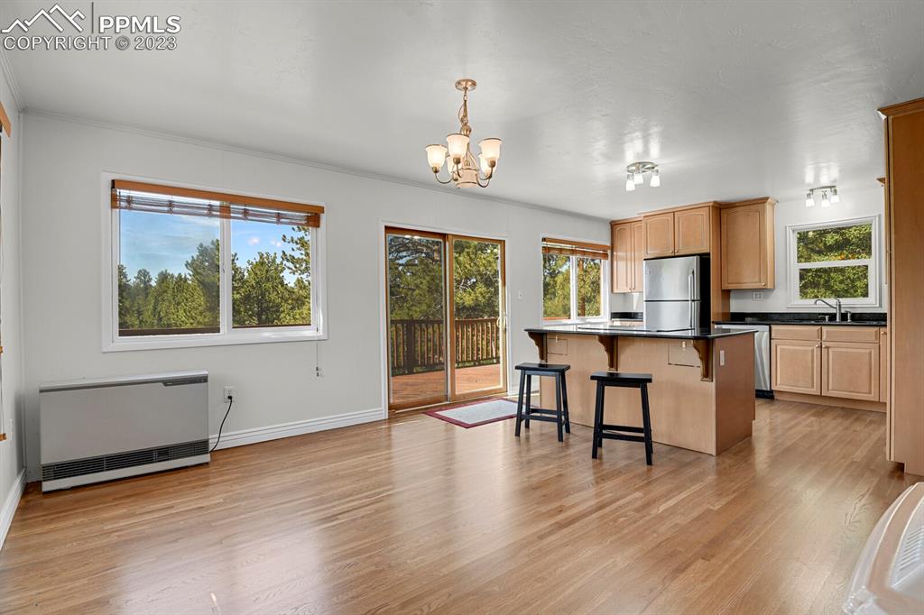 286 Ridge Road Divide, CO 80814 - Photo 11 of 27 a view of a livingroom with furniture window and wooden floor
