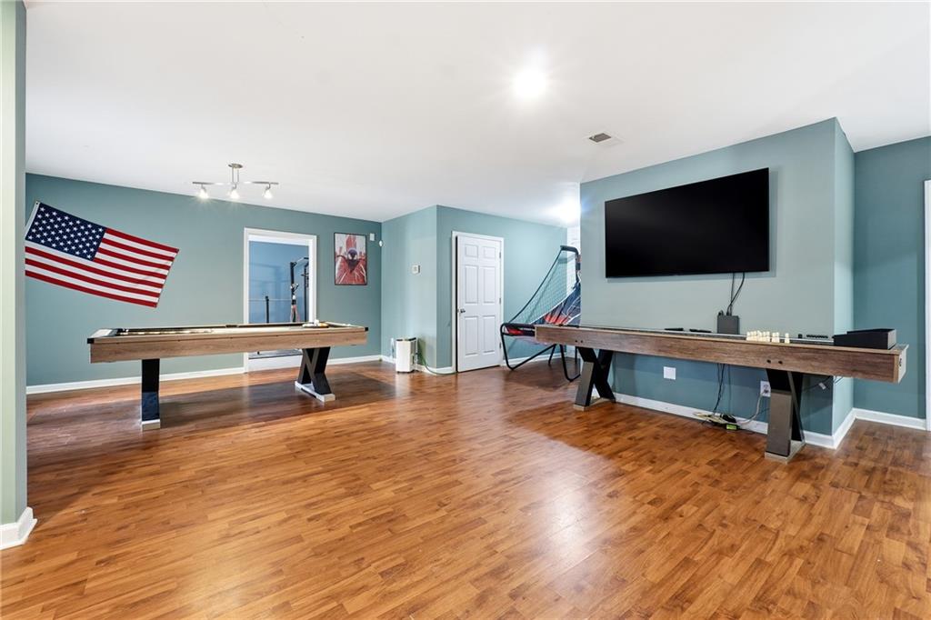 14 Isabella Court Cartersville, GA 30121 - Photo 11 of 33 a reading room with furniture and wooden floor