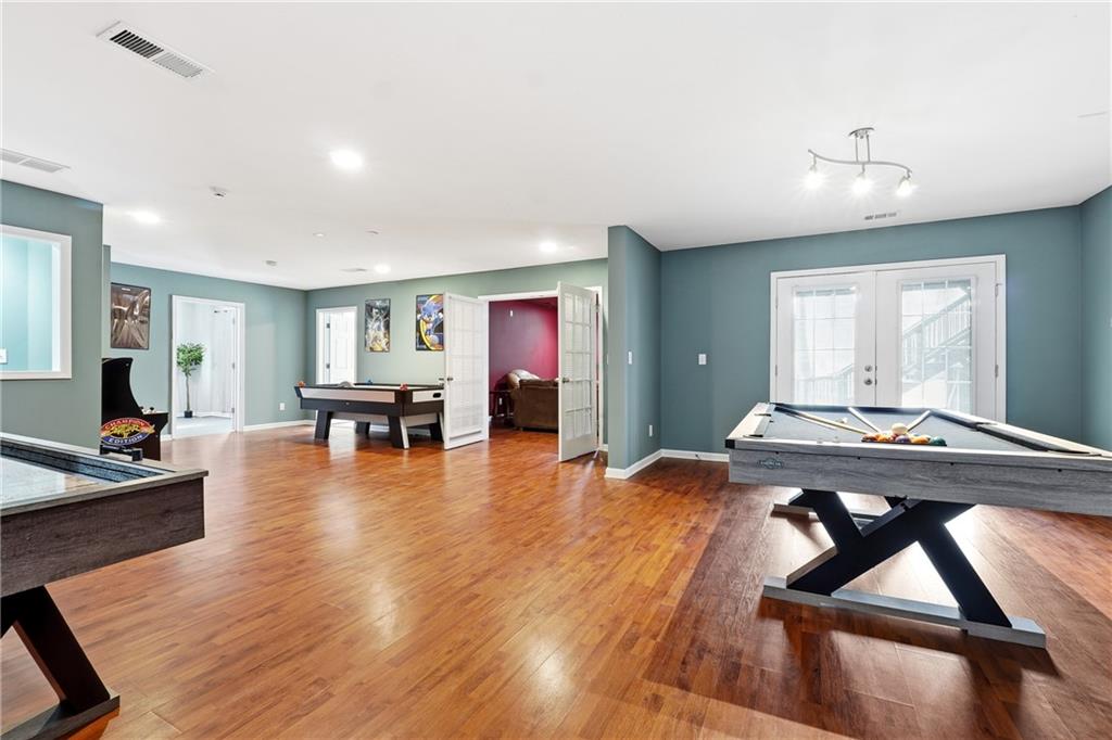 14 Isabella Court Cartersville, GA 30121 - Photo 13 of 33 a living room with furniture and wooden floor