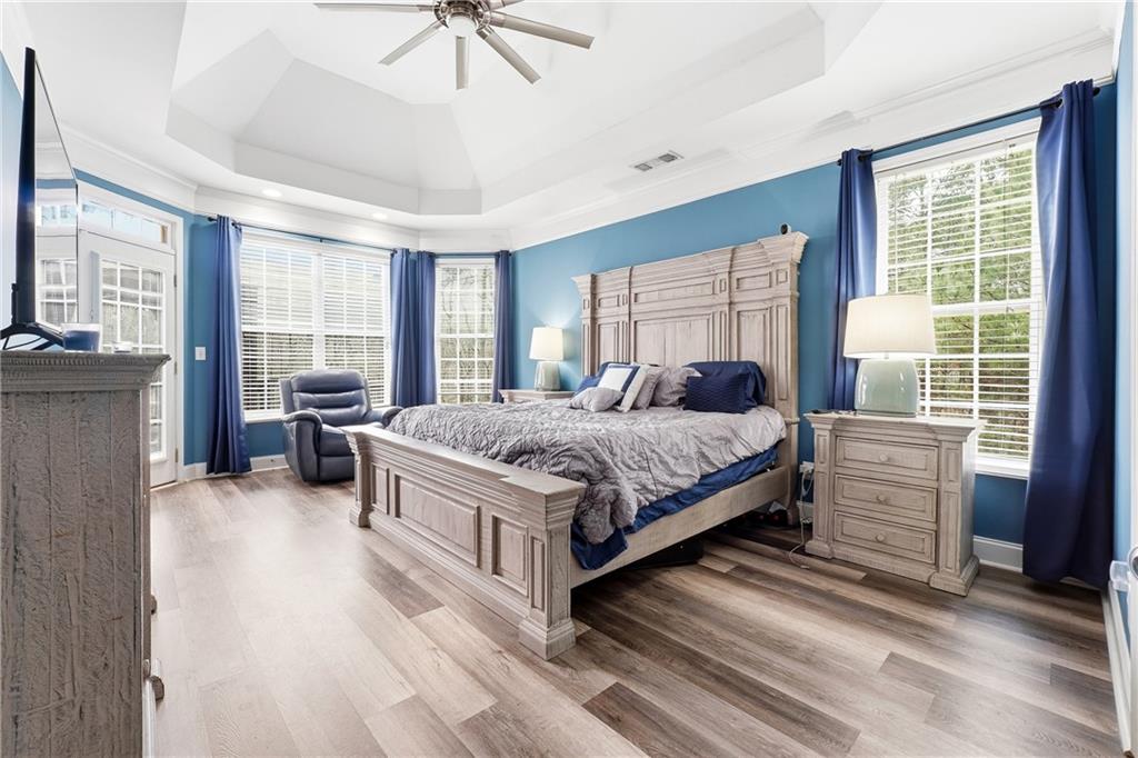 14 Isabella Court Cartersville, GA 30121 - Photo 16 of 33 a bedroom with a bed and a dresser