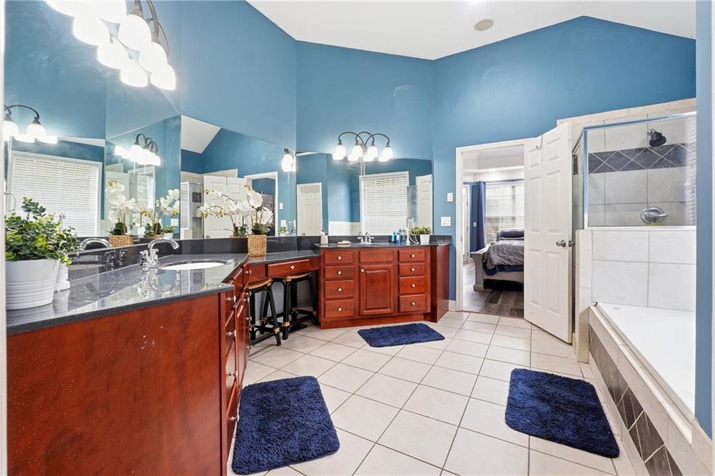14 Isabella Court Cartersville, GA 30121 - Photo 17 of 33 a kitchen with stainless steel appliances a refrigerator and a counter top space