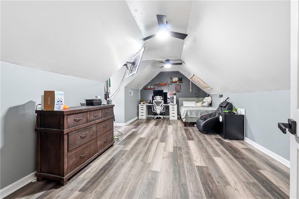 14 Isabella Court Cartersville, GA 30121 - Photo 22 of 33 a living room with furniture and wooden floor