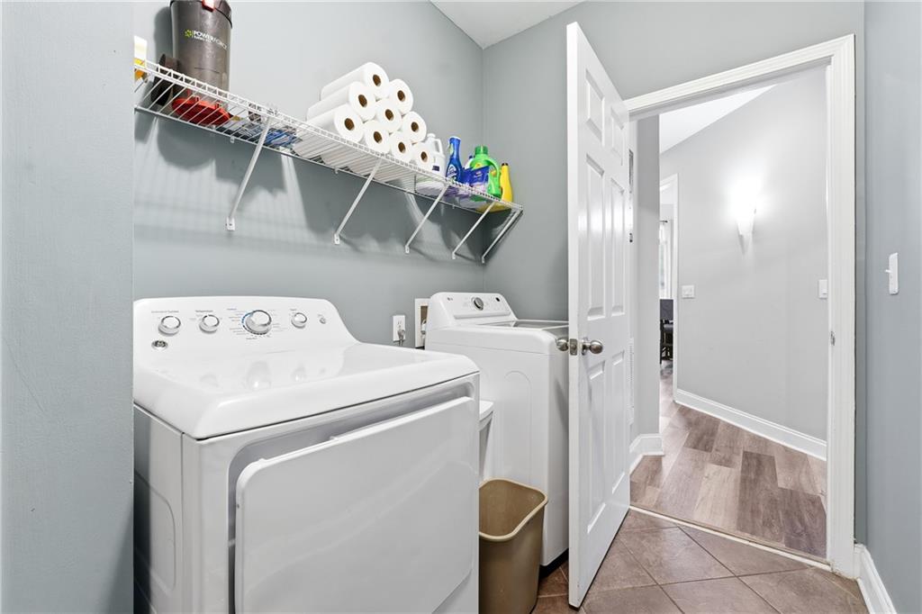 14 Isabella Court Cartersville, GA 30121 - Photo 25 of 33 a utility room with dryer and washer