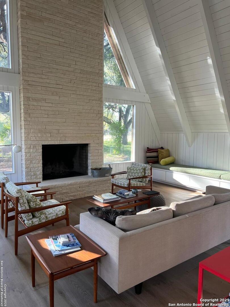 412 Lebouf Road Utopia, TX 78884 - Photo 27 of 42 a living room with furniture and a fireplace