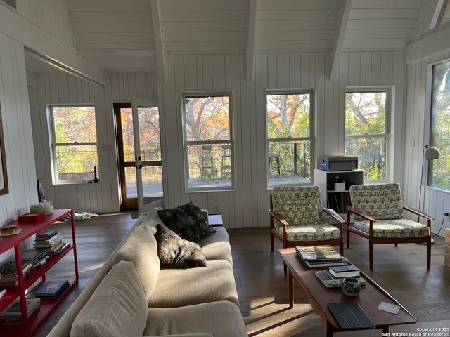 a view of swimming pool with a yard