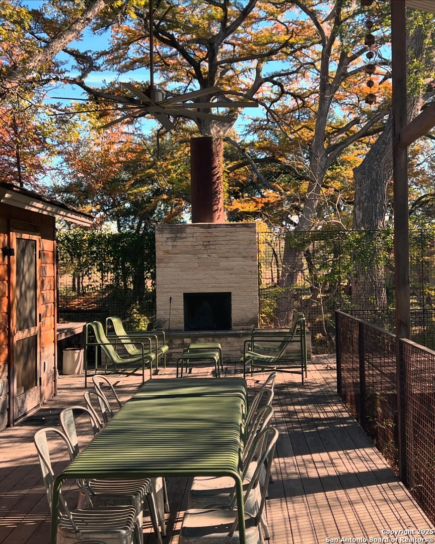 412 Lebouf Road Utopia, TX 78884 - Photo 34 of 42 a view of backyard with seating area and trees