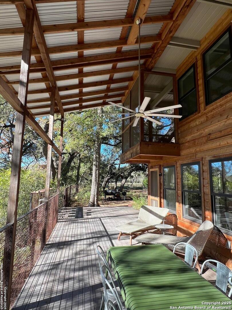 412 Lebouf Road Utopia, TX 78884 - Photo 38 of 42 a view of a backyard with sitting area