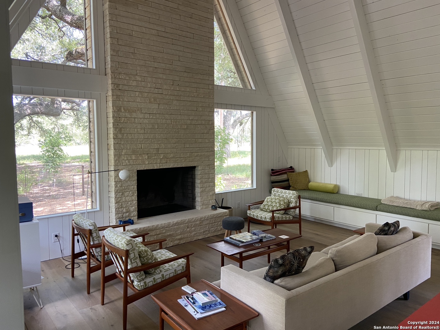 412 Lebouf Road Utopia, TX 78884 - Photo 8 of 42 a living room with furniture and a fireplace