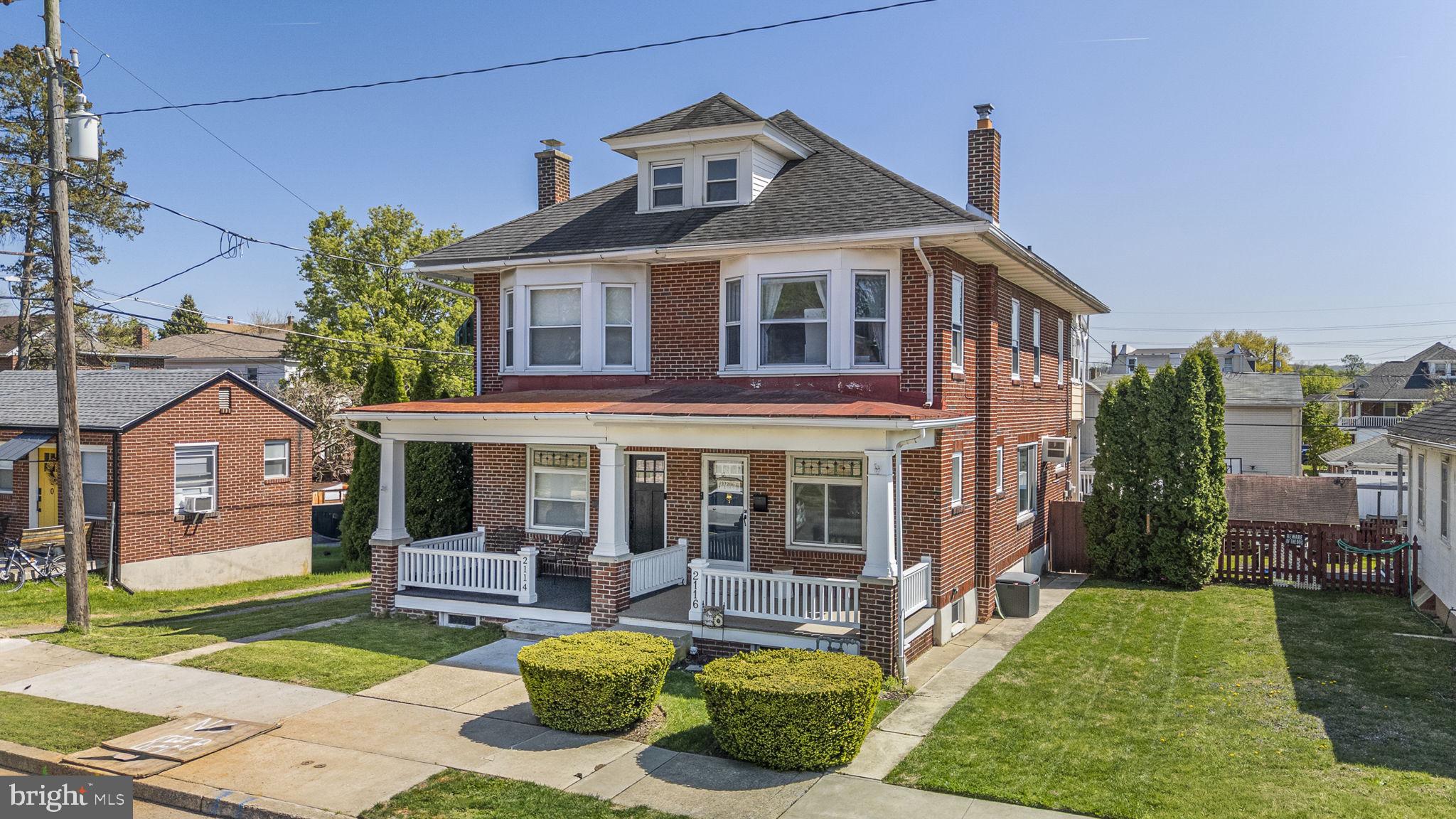 2116 Noble Street Reading, PA 19609 - Photo 1 of 35 Charming brick duplex with lush lawn.