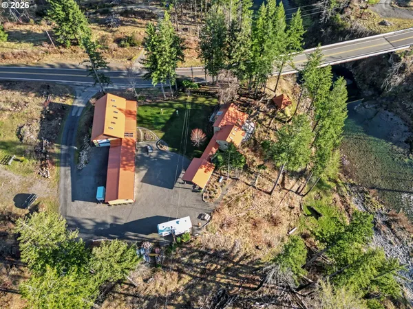 an aerial view of residential house with outdoor space