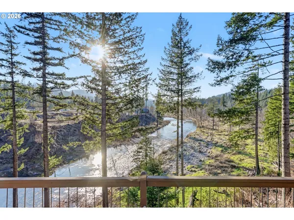 a view of balcony with a tree