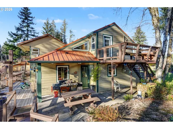 a view of a cafe with sitting area