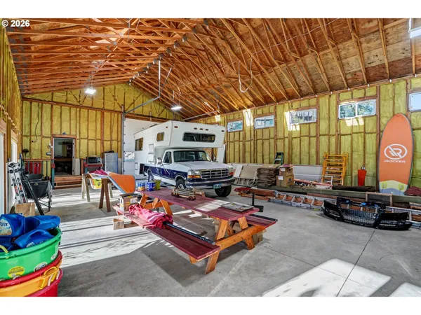 a view of swimming pool with a patio and a yard