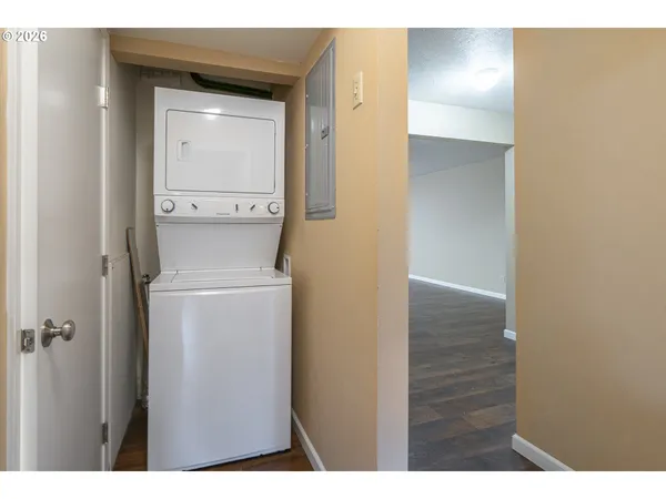 a view of bathroom with washer and dryer