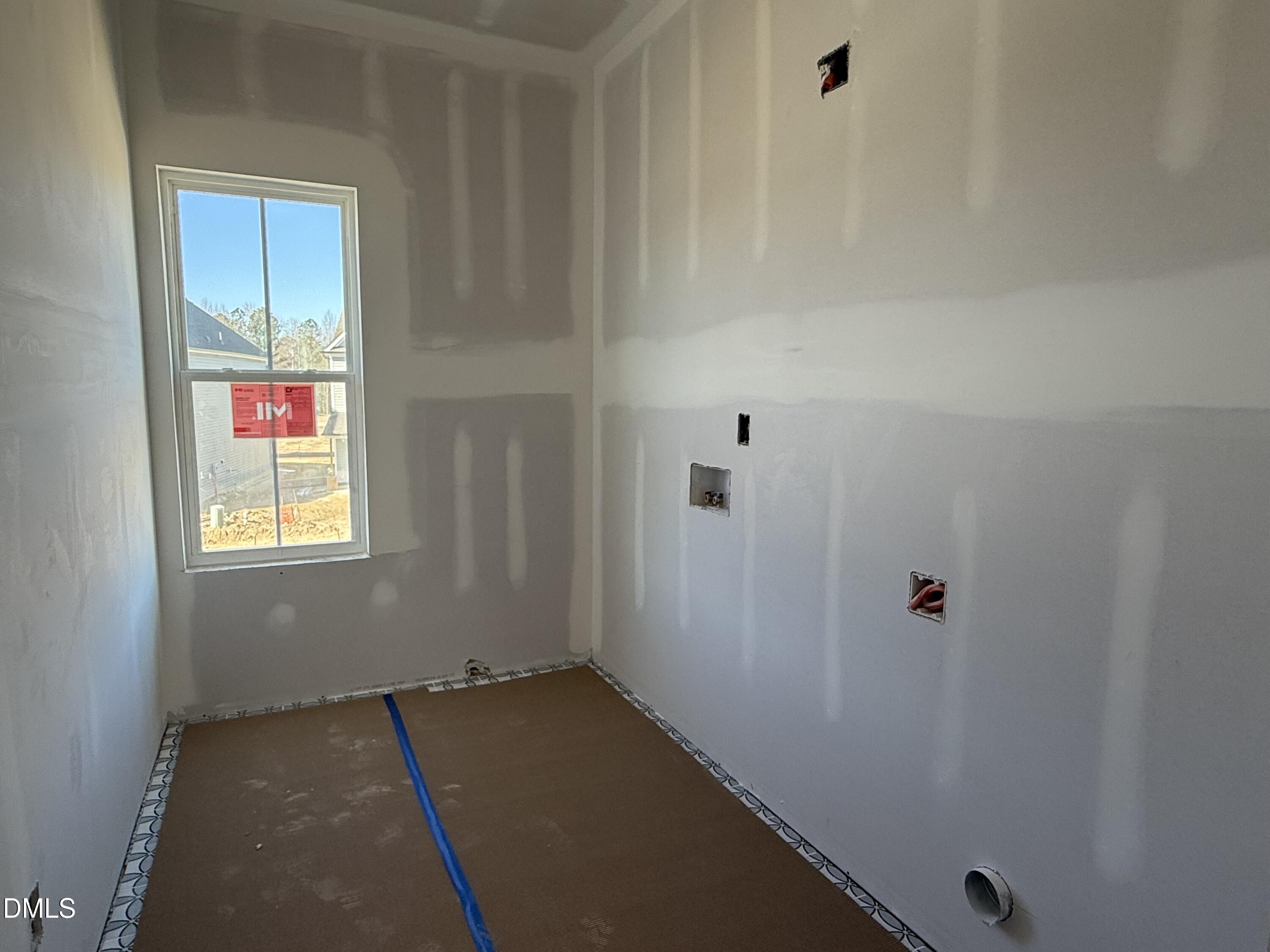 2205 Seraphic Way, Unit 403 Rolesville, NC 27571 - Photo 11 of 41 a view of an empty room