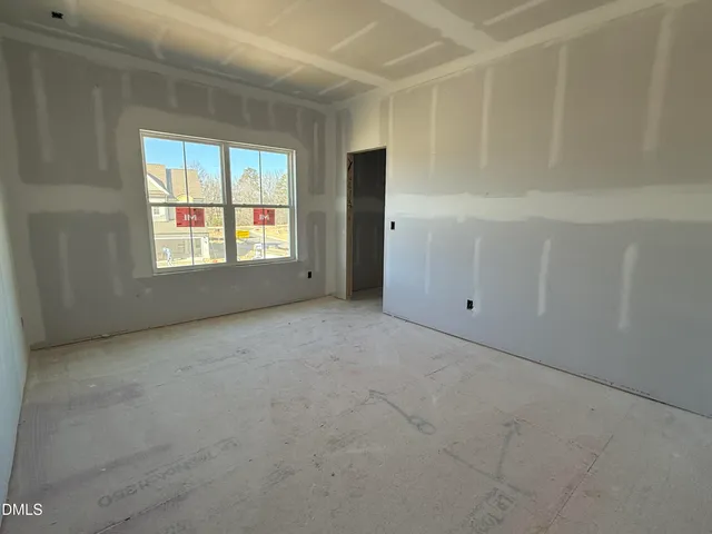 a kitchen with stainless steel appliances kitchen island granite countertop a sink and cabinets