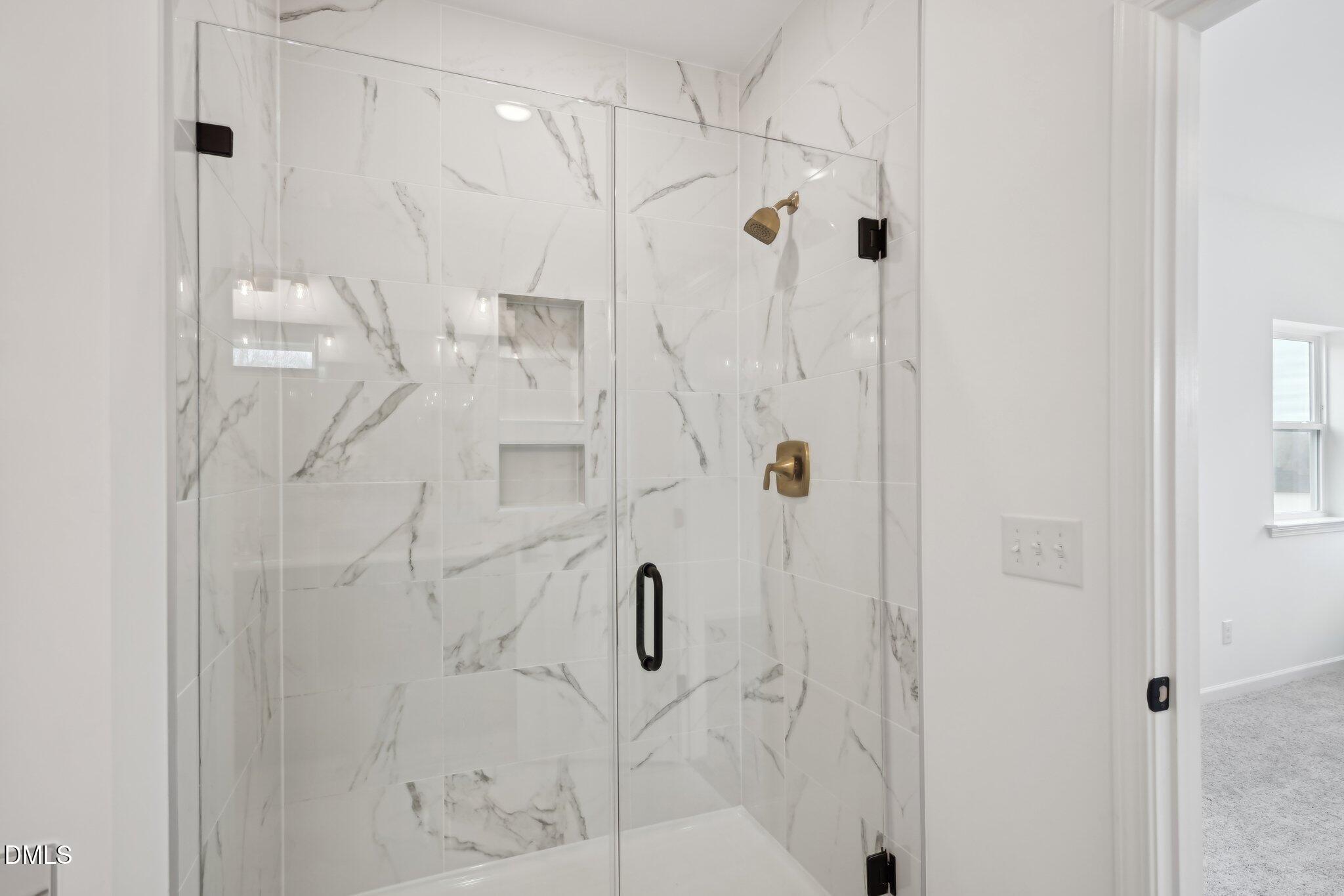 2205 Seraphic Way, Unit 403 Rolesville, NC 27571 - Photo 39 of 41 a bathroom with a shower