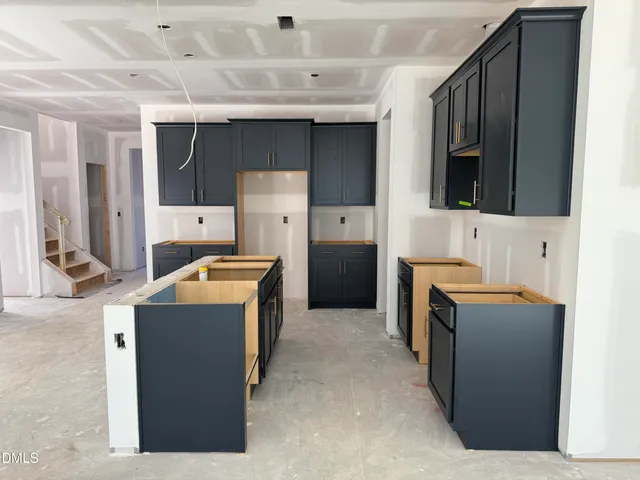 a bathroom with a bathtub and a sink