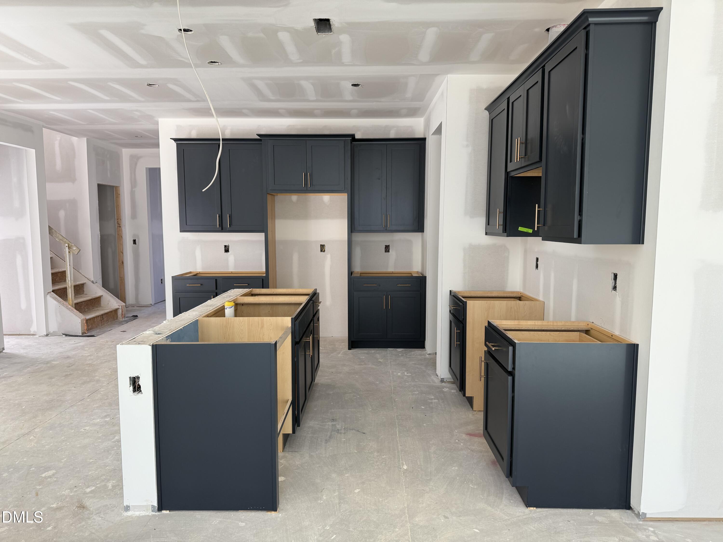 2205 Seraphic Way, Unit 403 Rolesville, NC 27571 - Photo 6 of 41 a utility room with dryer and washer