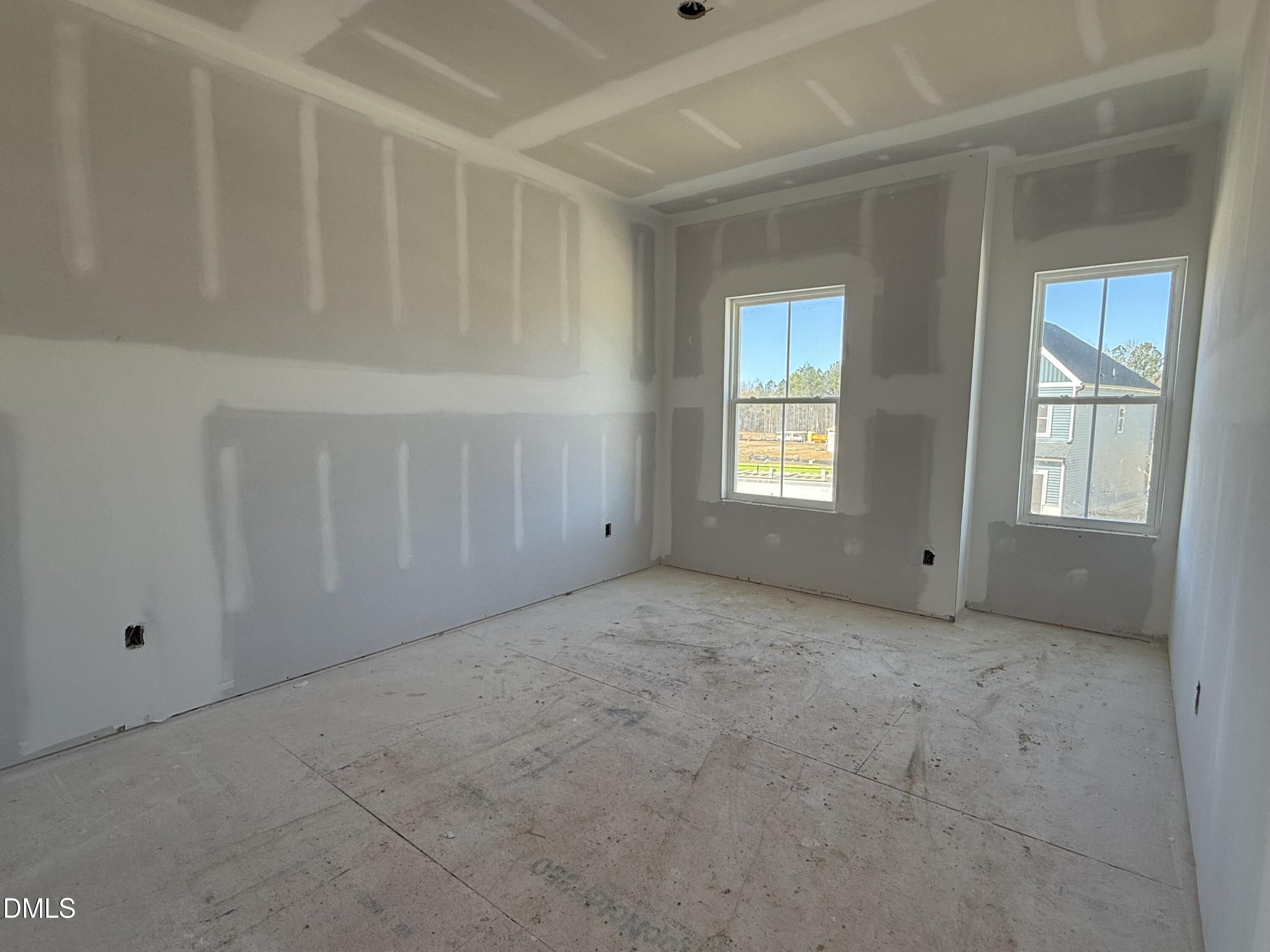 2205 Seraphic Way, Unit 403 Rolesville, NC 27571 - Photo 10 of 41 a view of an empty room with window