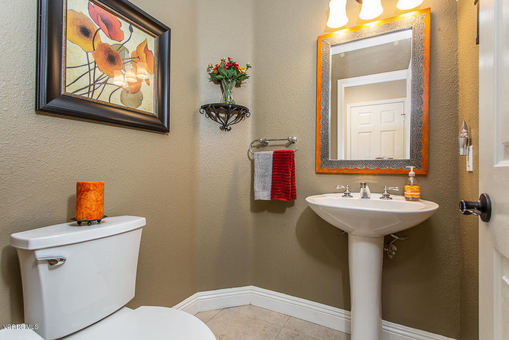 11249 Shadyridge Road Moorpark, CA 93021 - Photo 21 of 48 a bathroom with a sink and a toilet