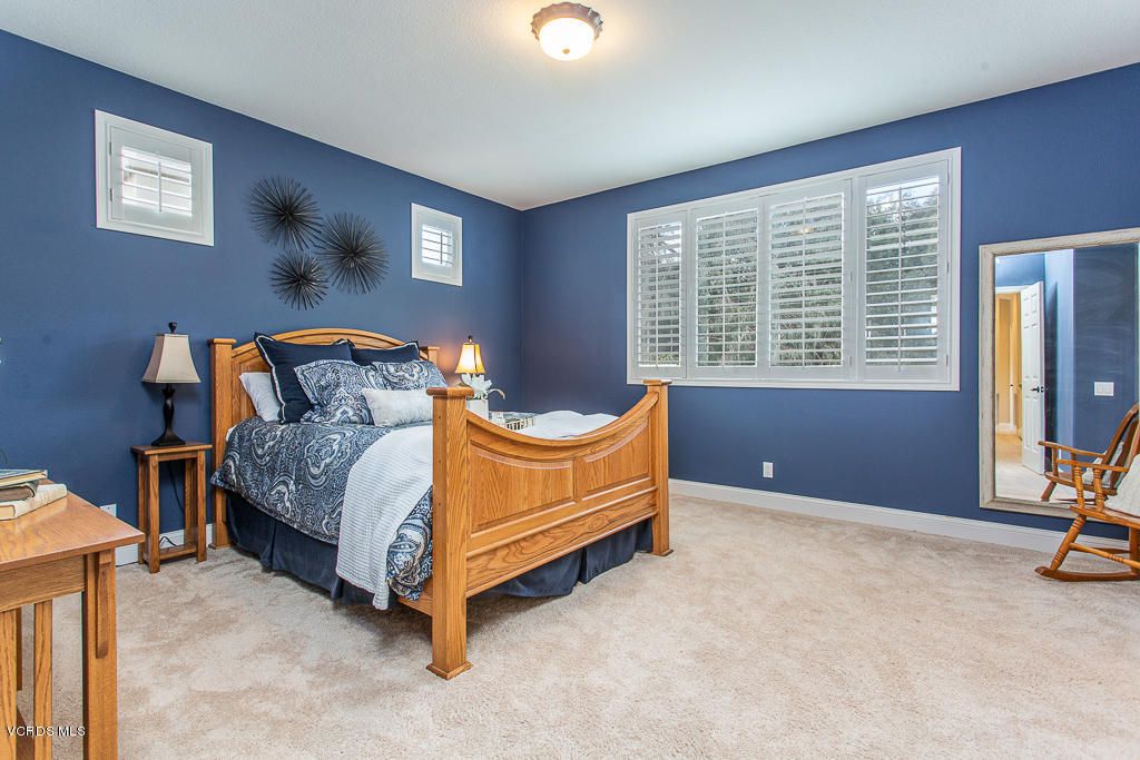 11249 Shadyridge Road Moorpark, CA 93021 - Photo 23 of 48 a bedroom with a bed and a window