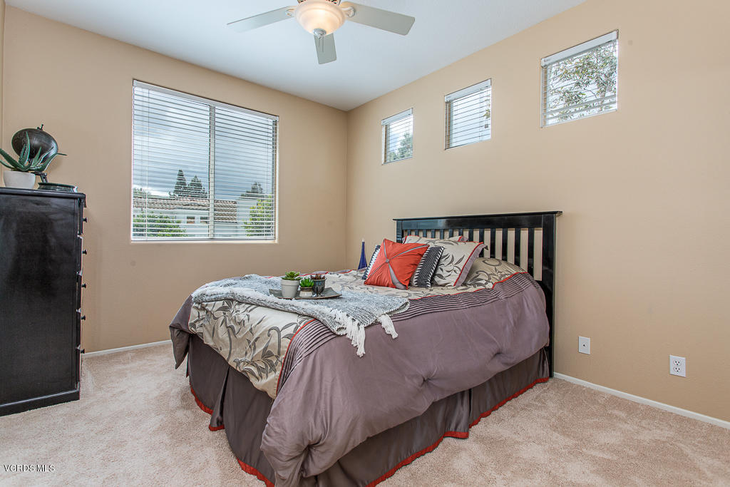 11249 Shadyridge Road Moorpark, CA 93021 - Photo 28 of 48 a bed sitting in a bedroom next to a window