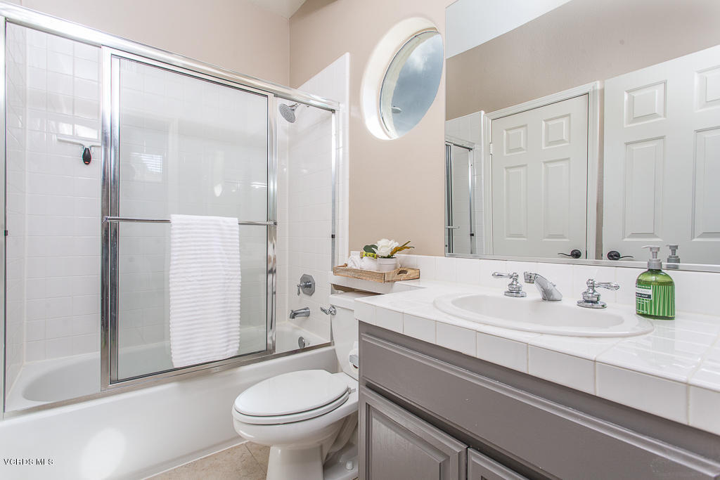 11249 Shadyridge Road Moorpark, CA 93021 - Photo 29 of 48 a bathroom with a sink toilet and shower