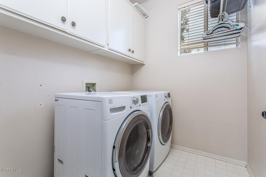 11249 Shadyridge Road Moorpark, CA 93021 - Photo 31 of 48 a utility room with dryer and washer